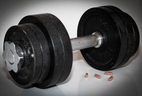 Dumbell and pills
