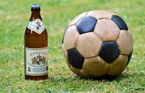 Beer bottle and football