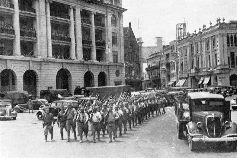 Japanese troops marching through Singapore