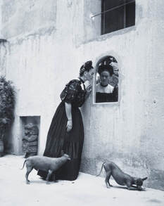 Frida Kahlo with her dogs