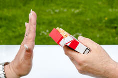 Person rejecting cigarette