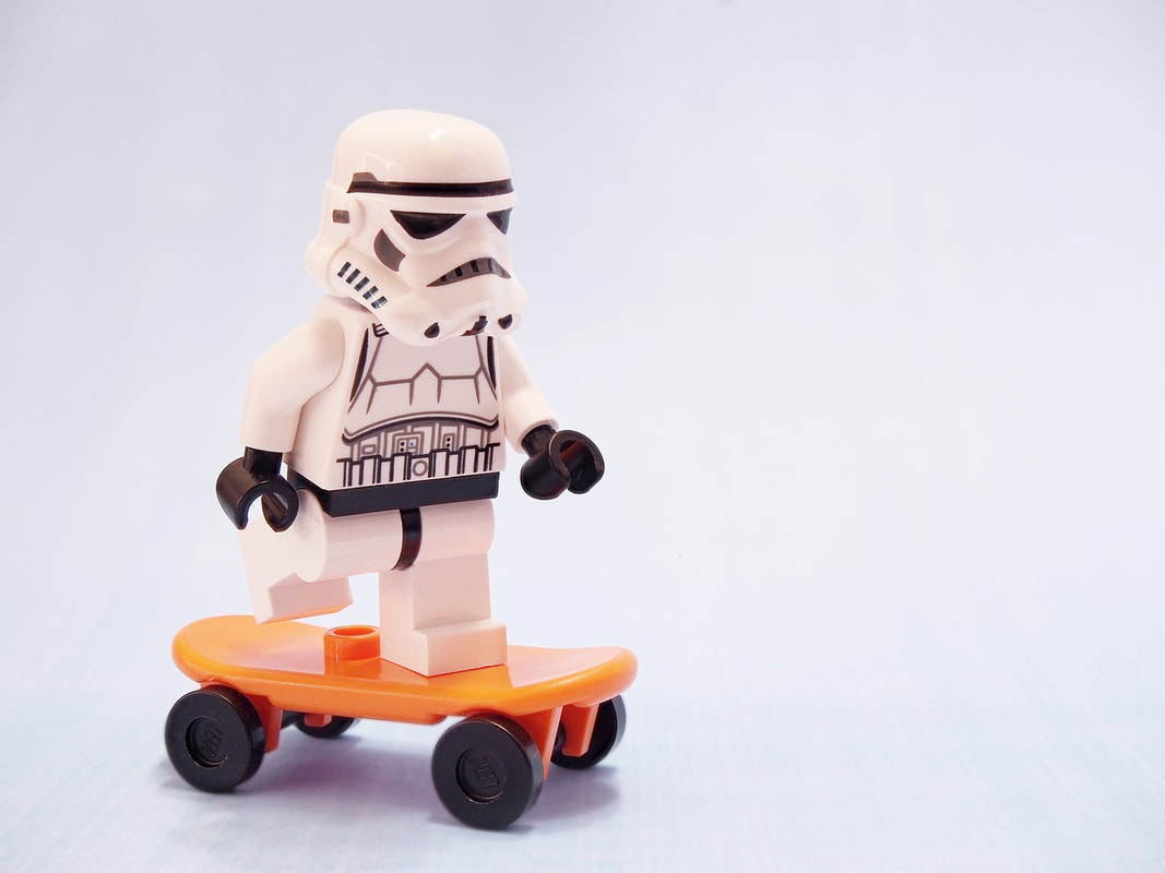 A Lego stormtrooper skateboarding